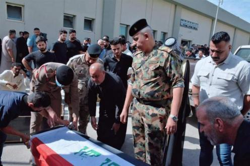 الدفاع تسلم رفات 26 شهيدا من ضحايا مجزرة سبايكر ال