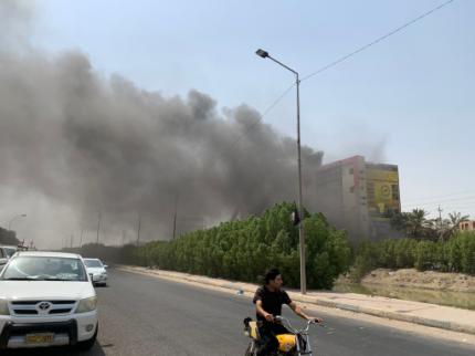 اندلاع حريق في عمارة تجارية للاجهزة الكهربائية وسط