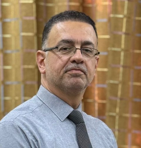 تدريسي في جامعة الكوفة يشارك في تأليف كت